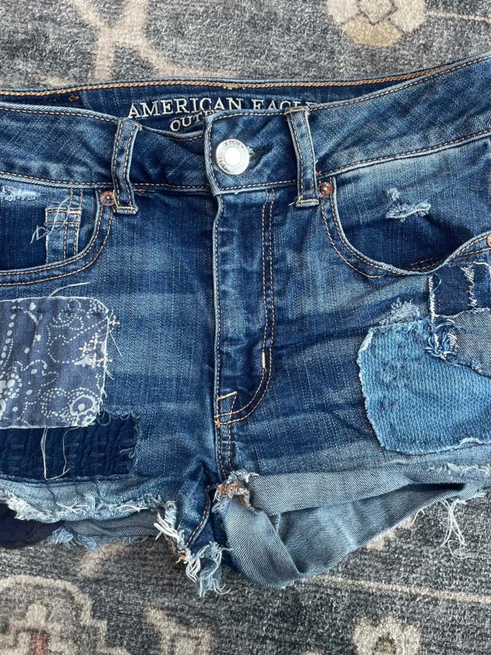 American Eagle Distressed Patch Denim Shorts - Blue